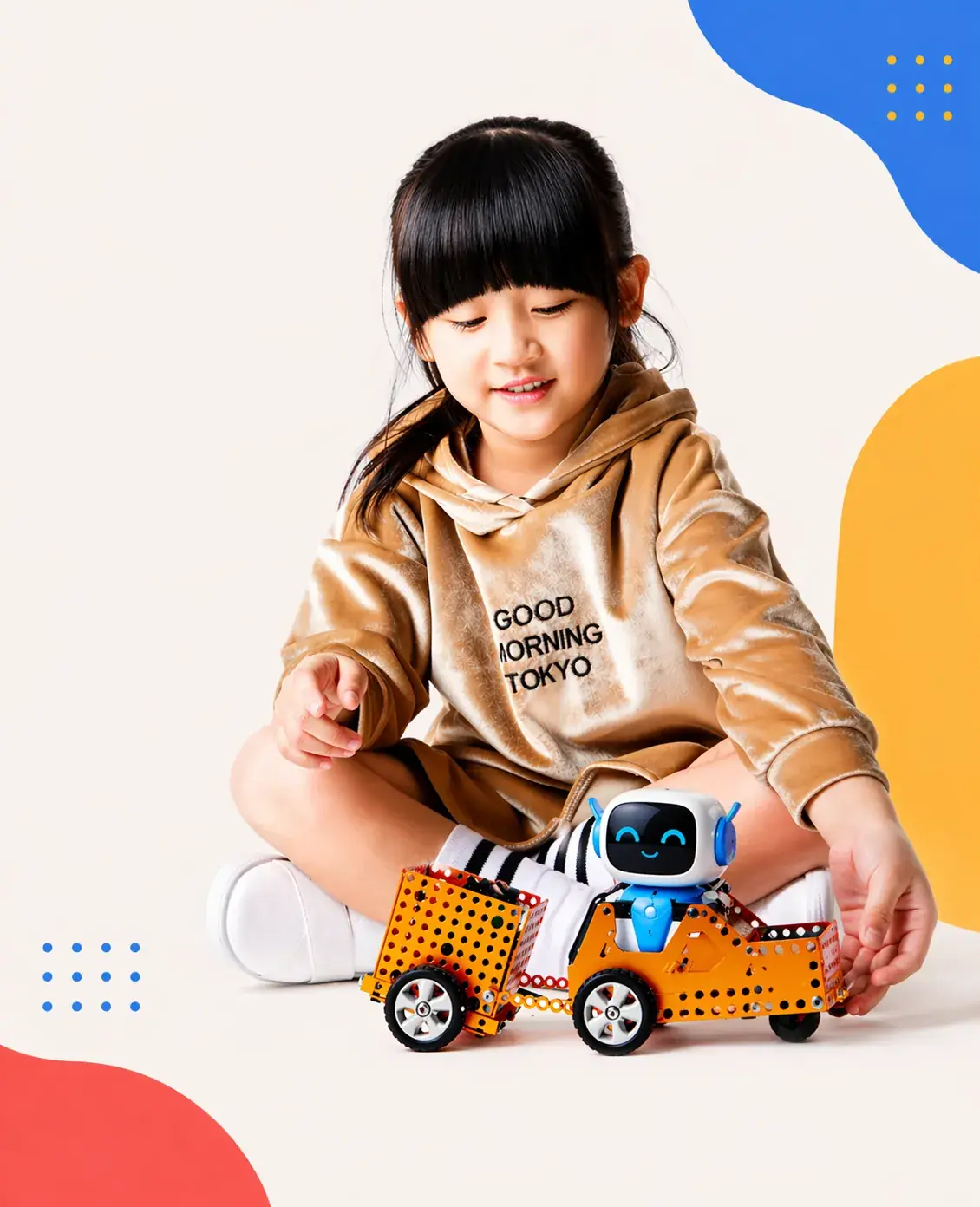 A student and her mentor laughing during a live ItsMyBot class